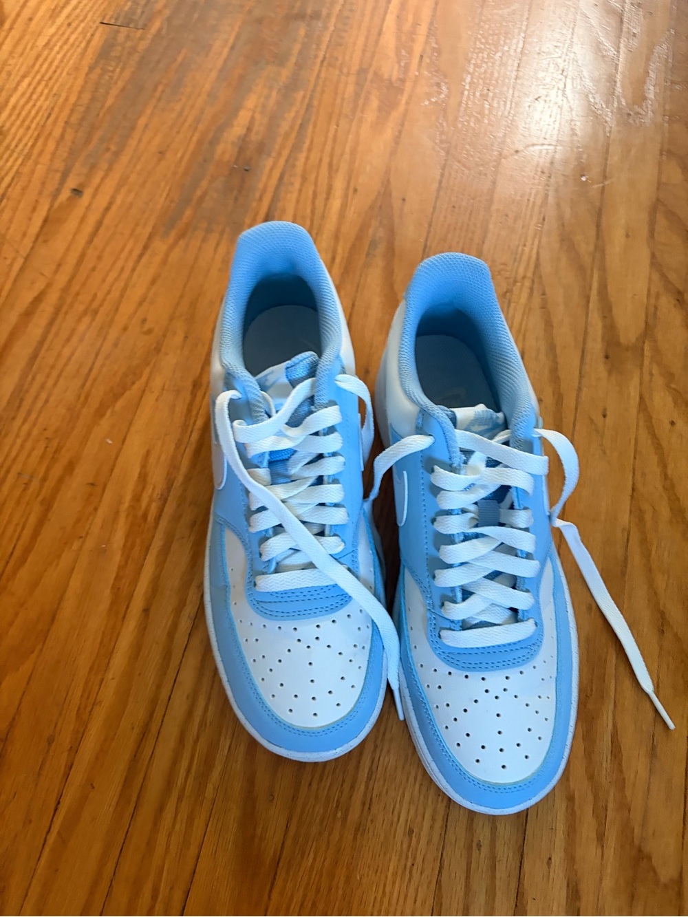 Nike wonen’s Blue and White Low-Top Sneakers